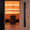 Picture taken just outside door of sauna looking into it. Western Red Cedar Walls and Harvia Pro Legend Heater.