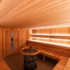 Picture taken from the back of the sauna sitting in the corner of the top benches looking towards the door. Western Red Cedar Walls and Harvia Pro Legend Heater.