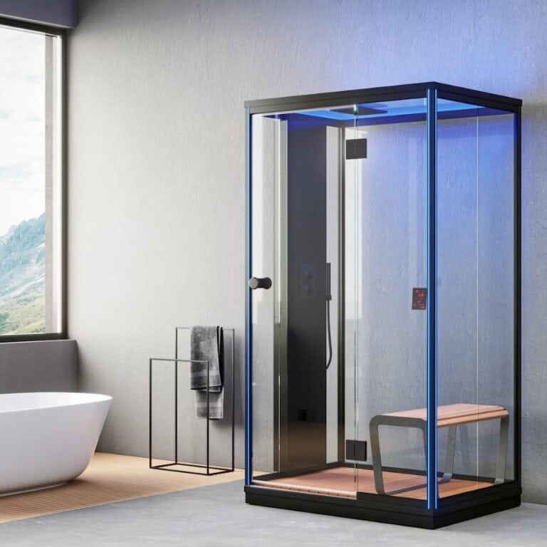 The Harvia Nova Steam Cabin next to a bath.