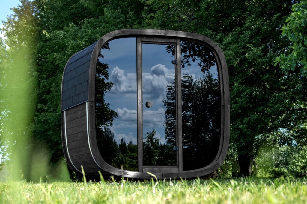 The Black Cube Sauna outside.