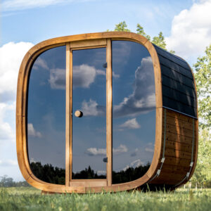 The Dice Sauna with Facing Bench Layout in an outdoor space.