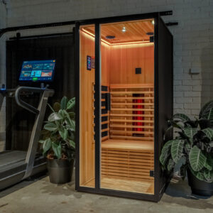 The Onyx Infrared Sauna next to a treadmill.