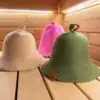 Bell shaped sauna hats in a sauna.