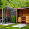 The Aera Outdoor Sauna in a garden.