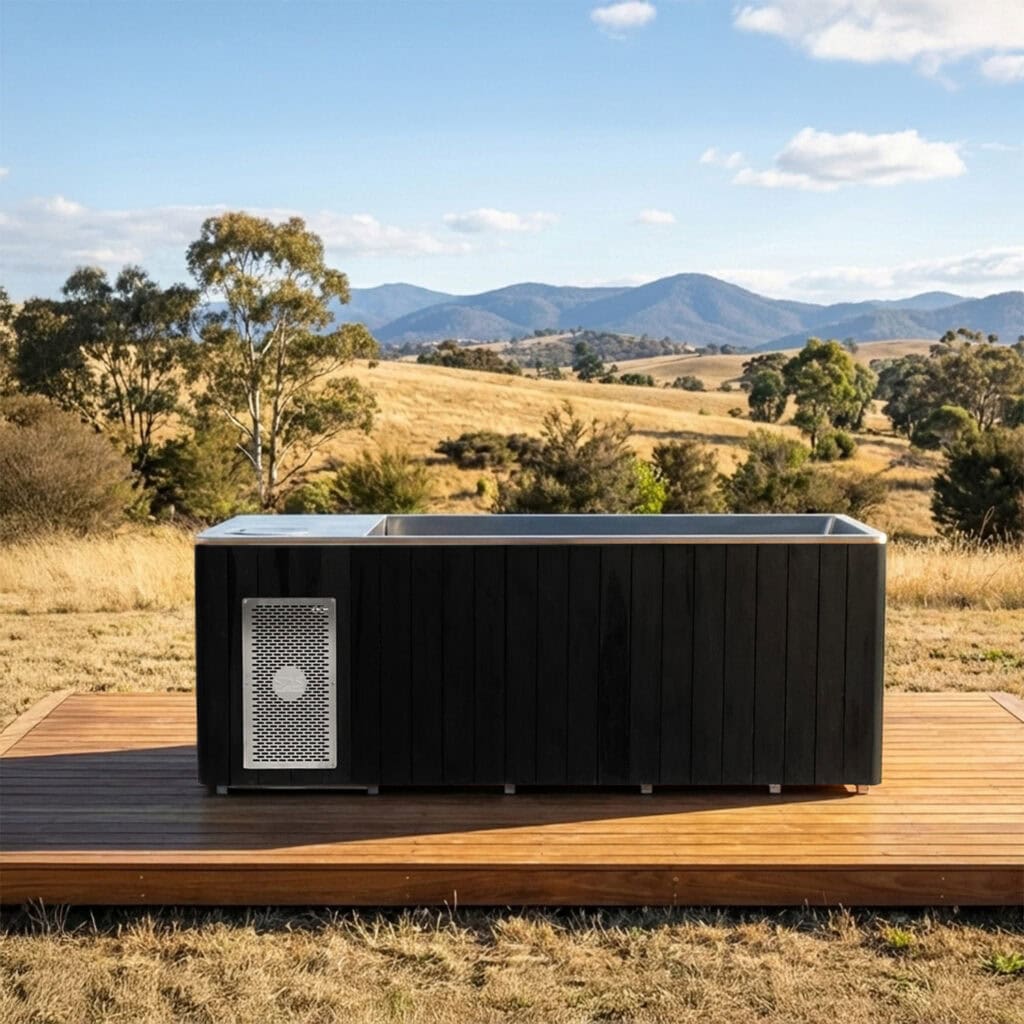A red cedar ice bath with black exterior in a natural landscape.