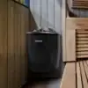 The Harvia Moderna Sauna Heater set up with rock inside.