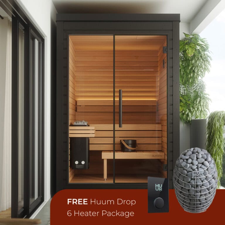 Sauna room with wooden interior, heater, and accessories for relaxation and wellness.