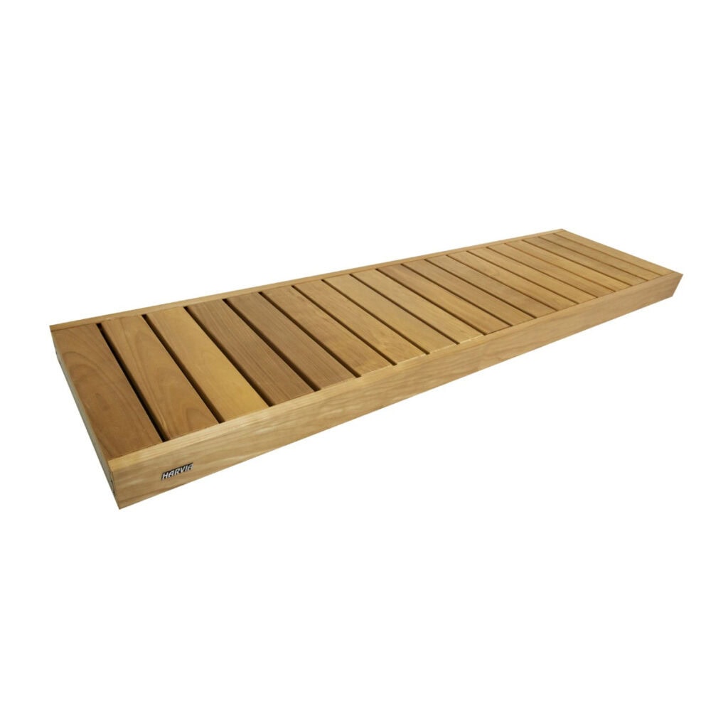 Long wooden slatted bench (sauna bench) with a light finish and a brand label on the side, extending diagonally across the image