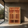 Wooden indoor sauna with glass door in a modern concrete-walled room, warm lighting, and built-in benches. (SDS Australia logo)