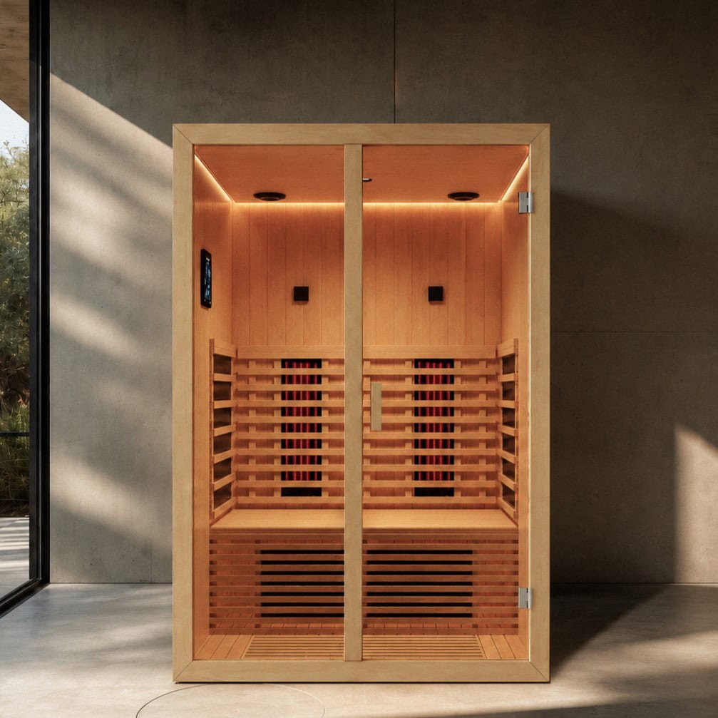 Wooden sauna cabin with a glass door, warm interior lighting, and tiered benches inside the enclosure.