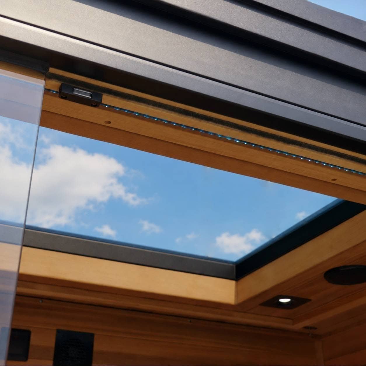 SkyLens™ Smart Glass double-glazed Low-E skylight inside the SDS SAGA HALO™ outdoor infrared sauna