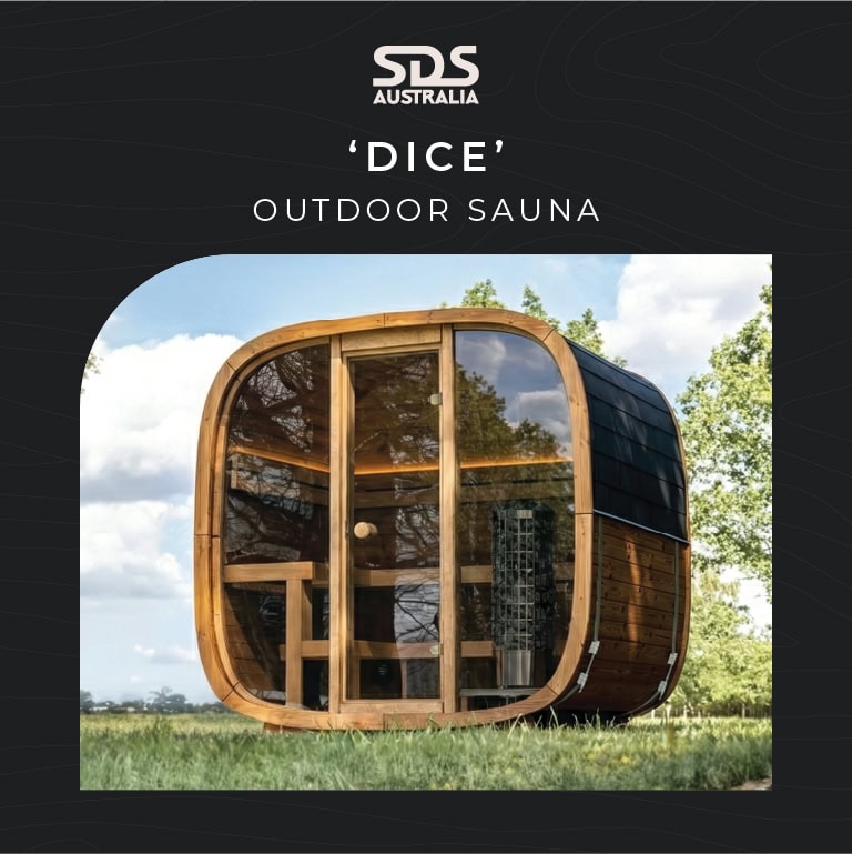 DICE outdoor sauna by SDS Australia, a rounded wooden cabin on a grassy field outdoors